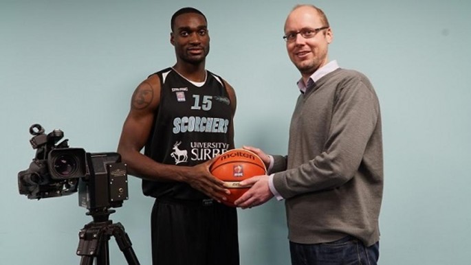 Tayo Ogedengbe (Surrey Scorchers) and Stephen Carter, Managing Director of Hawk-Eye with an AFC-head