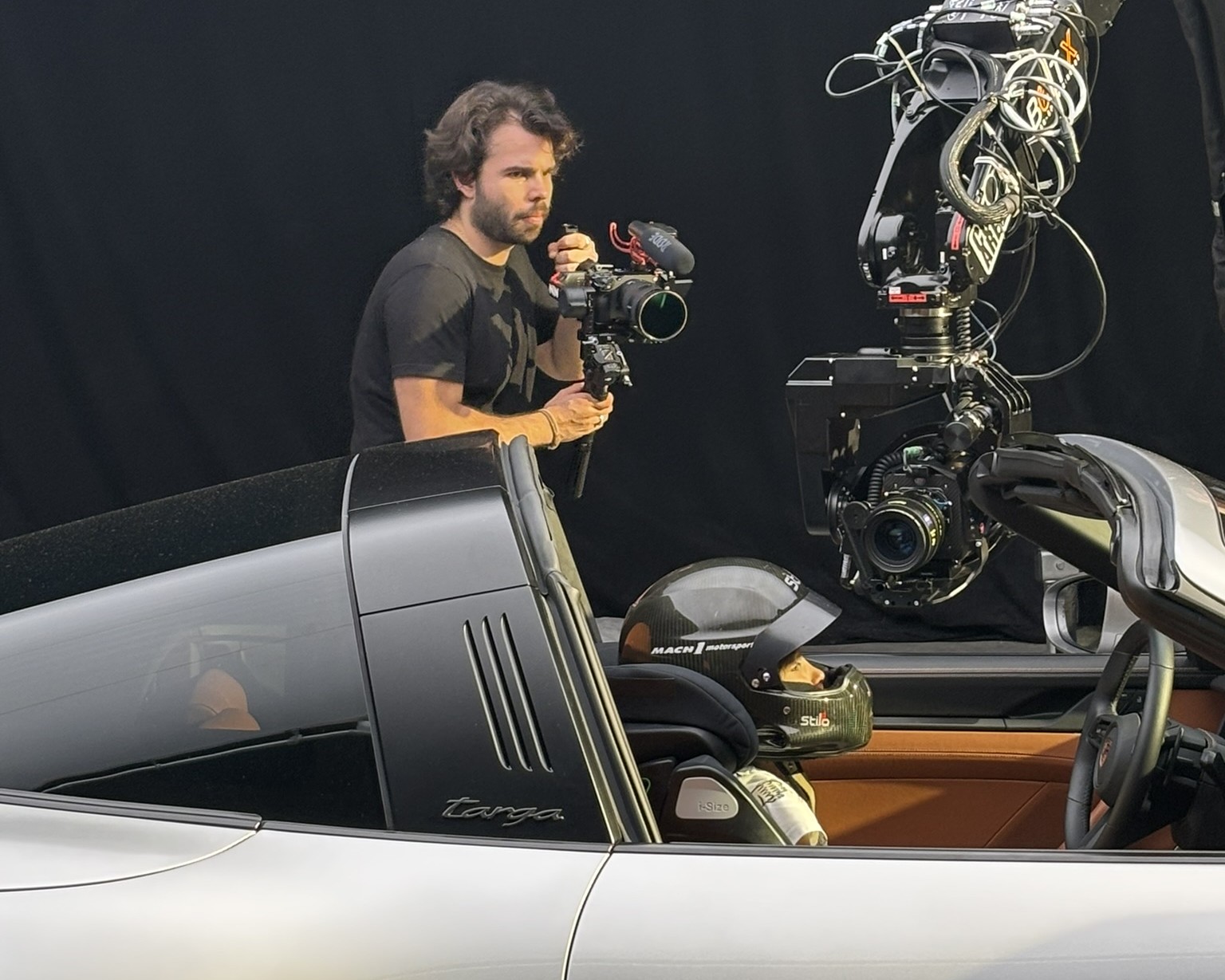 Bolt PTR films child inside of Porsche 911 while videographer captures behind-the-scenes footage