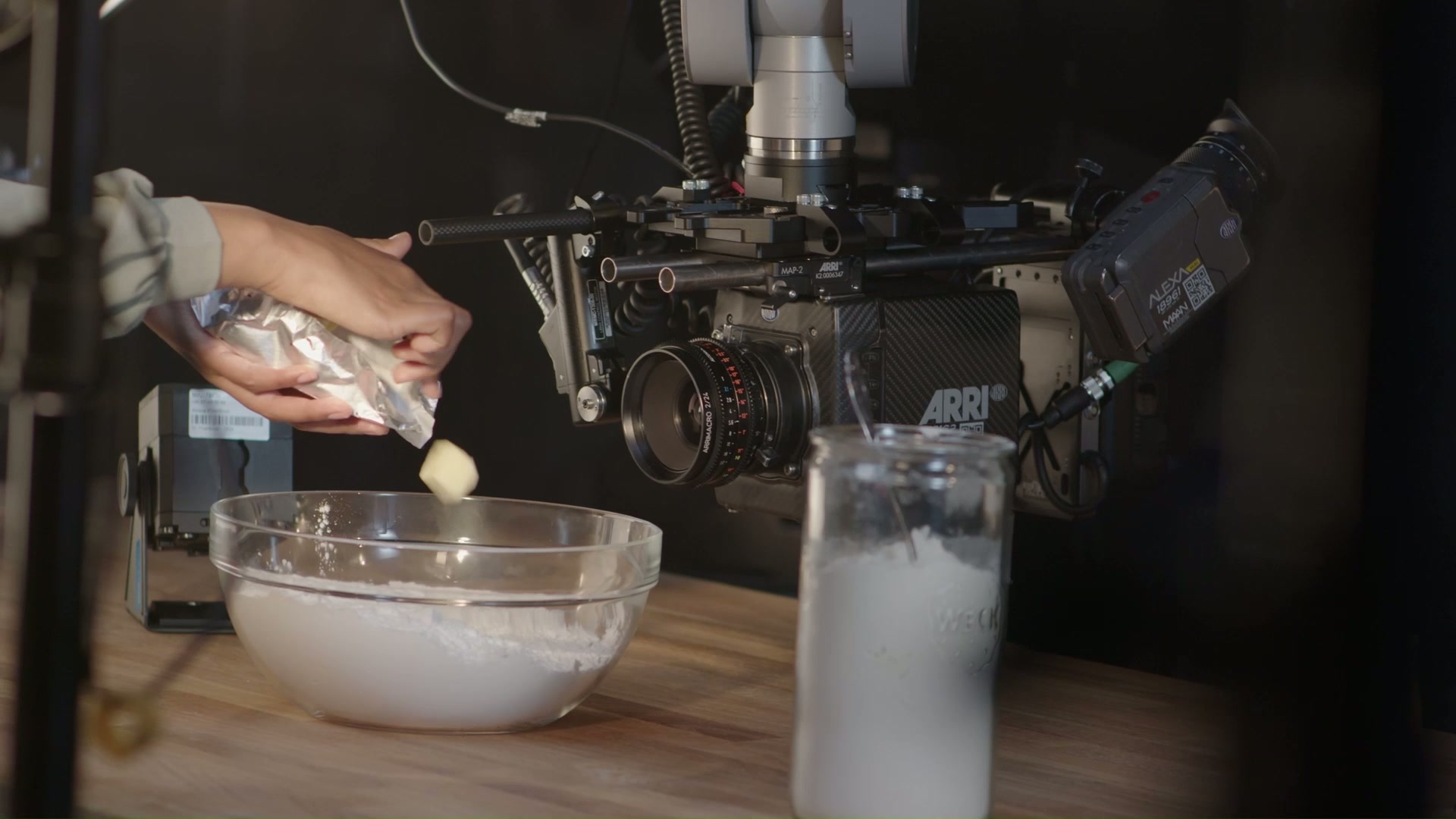 Butter being dropped in front of a camera on a Bolt arm to produce a slow-motion effect.
